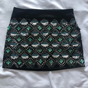 Marciano mini skirt with gem rhinestone appliqués